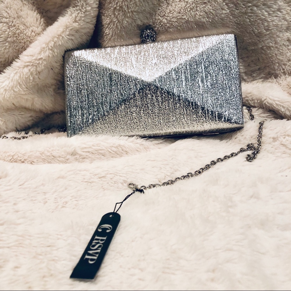 Stunning RSVP charming Charlie clutch with strap